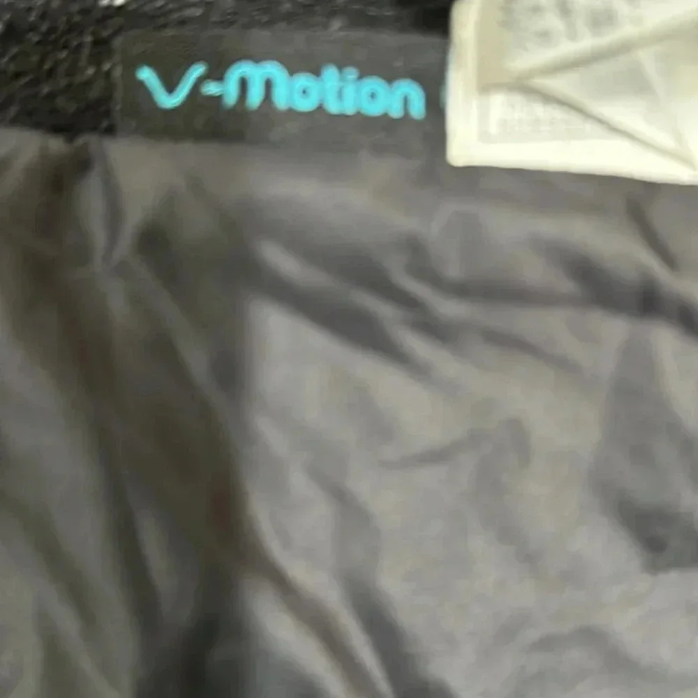 The North Face black puffer vest full front zip, pockets, front and back logo